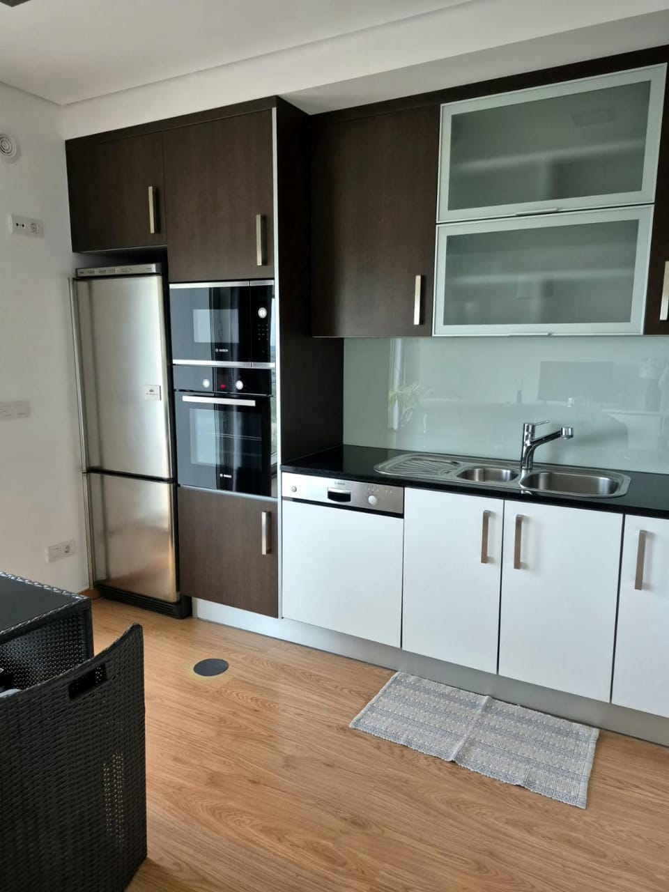 Kitchen or kitchenette, dishwasher, oven, stove