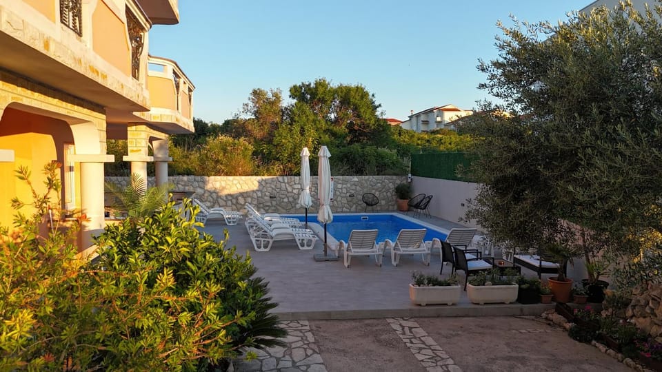 Property building, Patio, Swimming pool