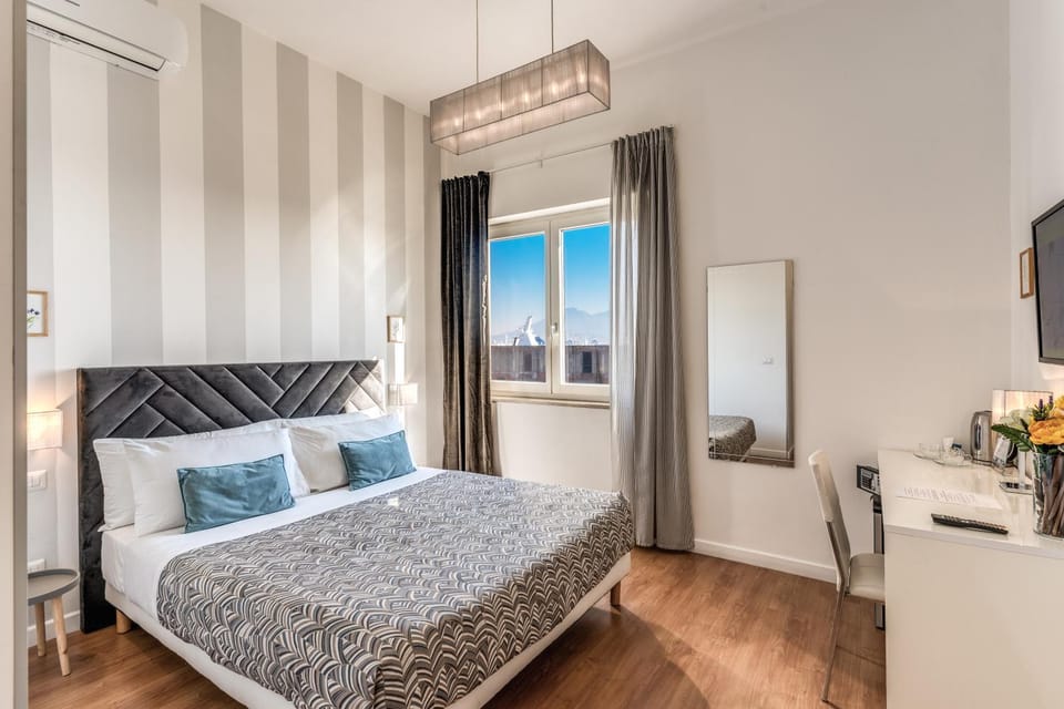 Nearby landmark, Bed, TV and multimedia, Coffee/tea facilities, View (from property/room), View (from property/room), Photo of the whole room, Decorative detail, Decorative detail, Bedroom, City view, City view, Landmark view, Landmark view, Sea view, Sea view, Street view, Street view, bidet, hair dresser, heating, heating, internet, internet, locker, locker, safe, safe, towels, towels, air conditioner, air conditioner