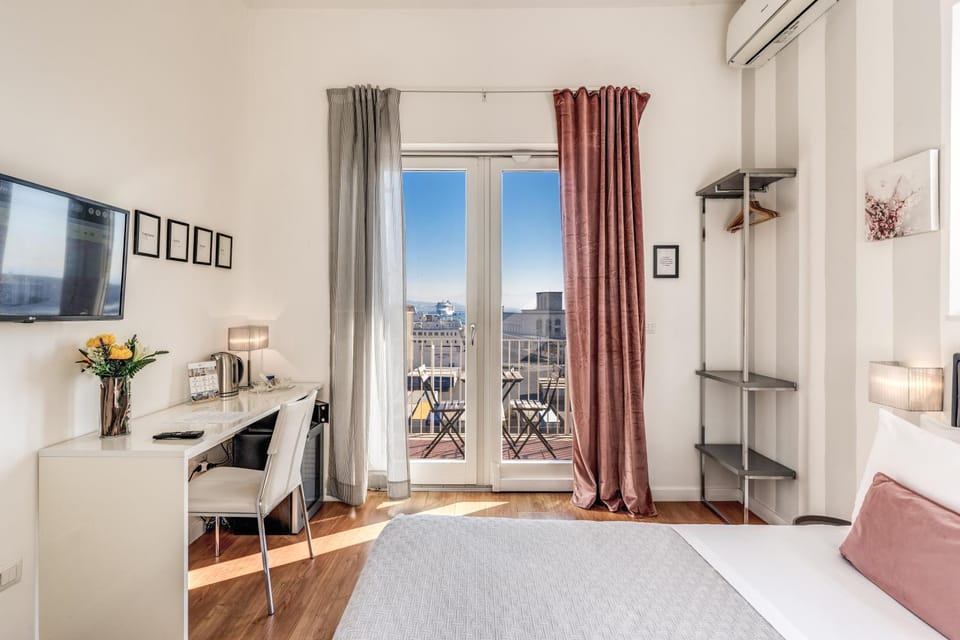Nearby landmark, Bed, TV and multimedia, View (from property/room), Balcony/Terrace, Other, Other, Photo of the whole room, Decorative detail, Decorative detail, Bedroom, City view, City view, Landmark view, Landmark view, Sea view, Sea view, Street view, Street view, bidet, furniture, furniture, hair dresser, heating, heating, internet, internet, locker, locker, room service, safe, safe, towels, towels, elevator, air conditioner, air conditioner
