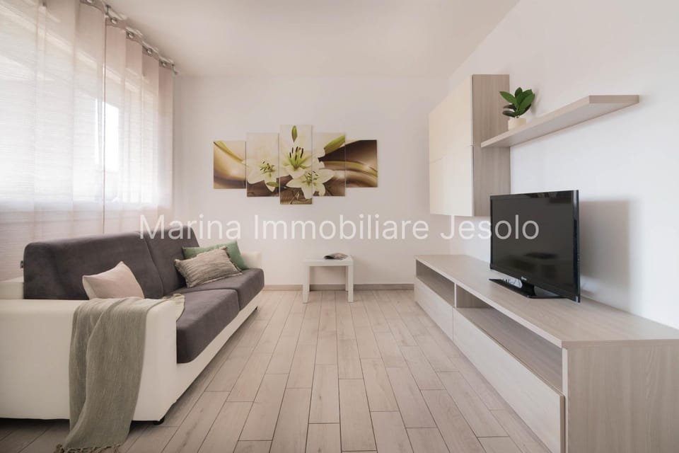 TV and multimedia, Living room, Seating area, Evening entertainment, Text overlay