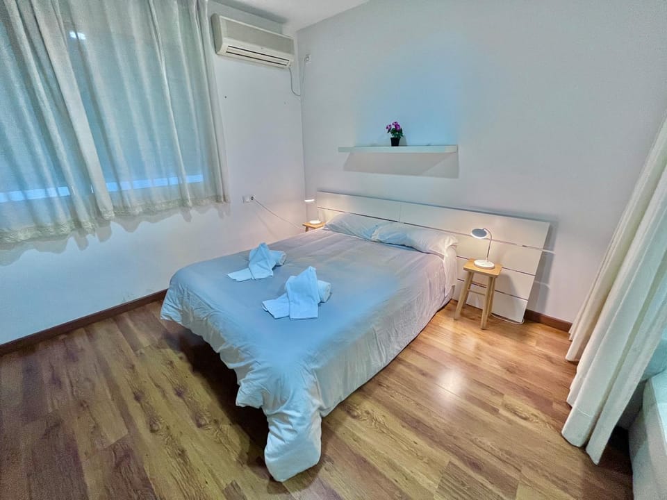 Bed, Photo of the whole room, Bedroom, towels, air conditioner