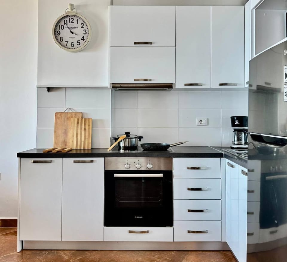Kitchen or kitchenette, stove