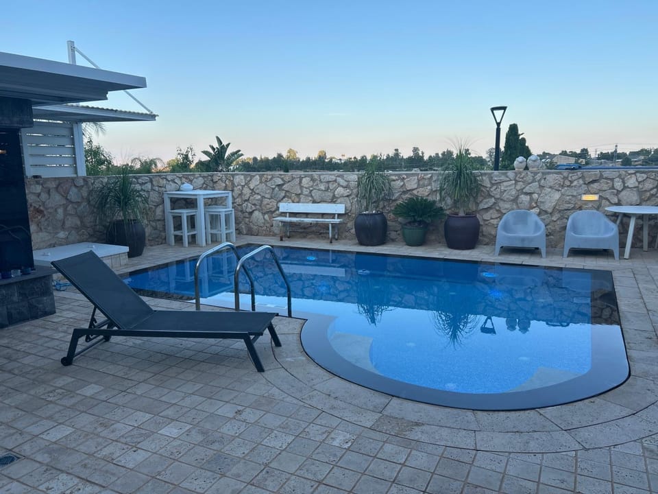 Swimming pool, sunbed