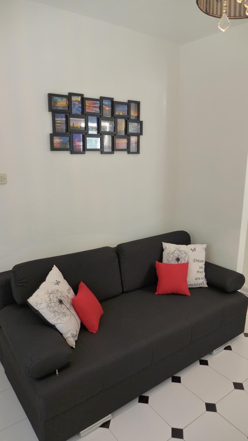 Bed, Living room, Seating area