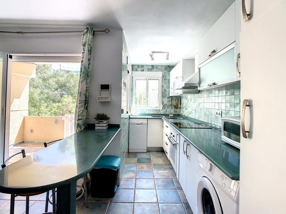 Kitchen or kitchenette, Dining area, dishwasher, oven, stove, washing machine