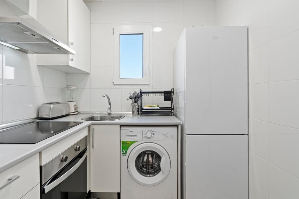Kitchen or kitchenette, washing machine