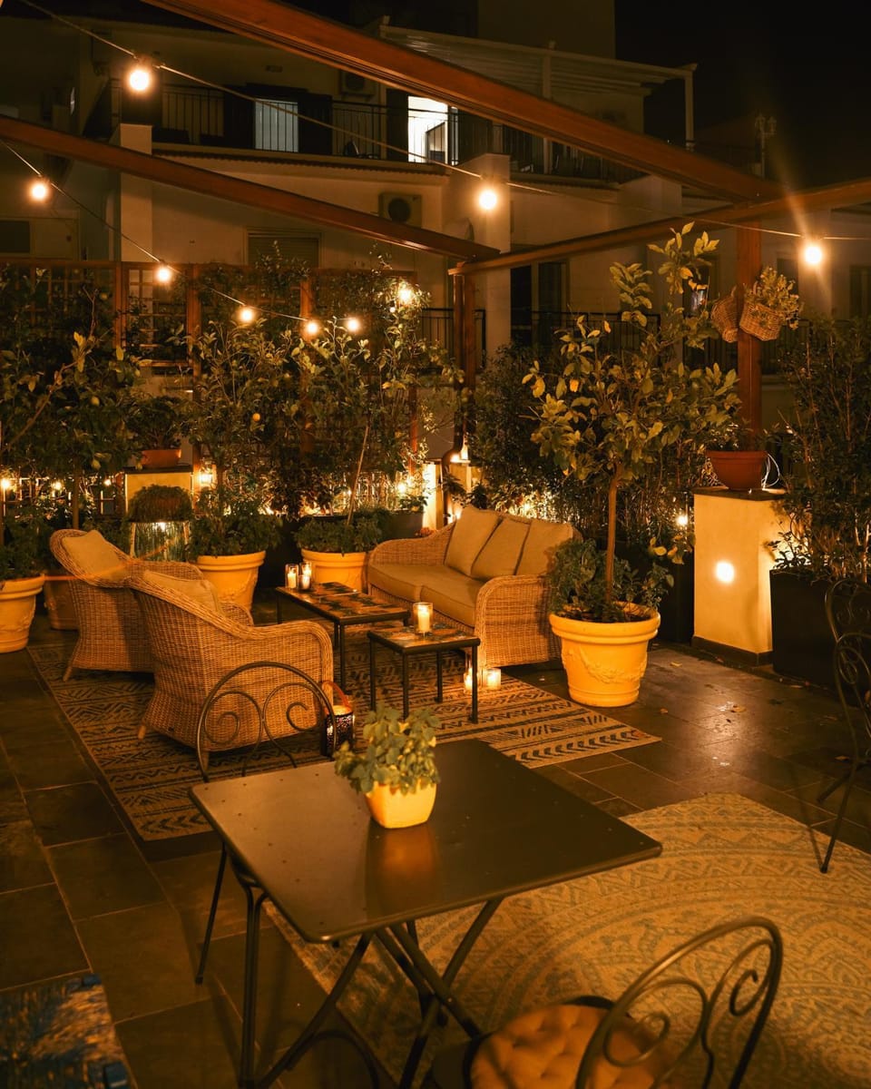 Property building, Patio, Night, Balcony/Terrace, Seating area