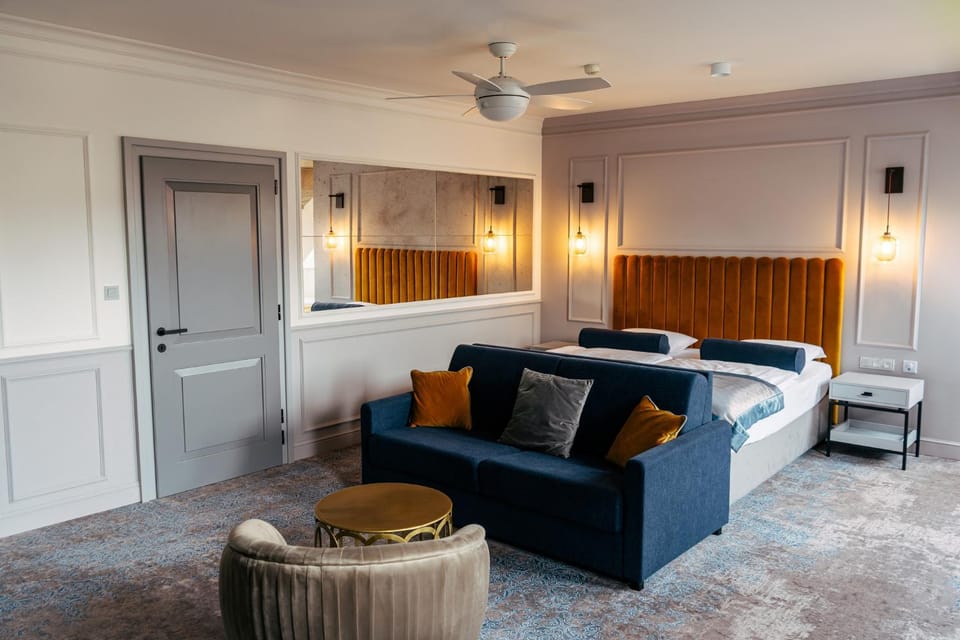 Bed, Living room, Seating area, Bedroom, fireplace