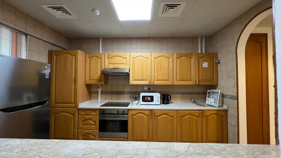 Kitchen or kitchenette, stove, kitchen