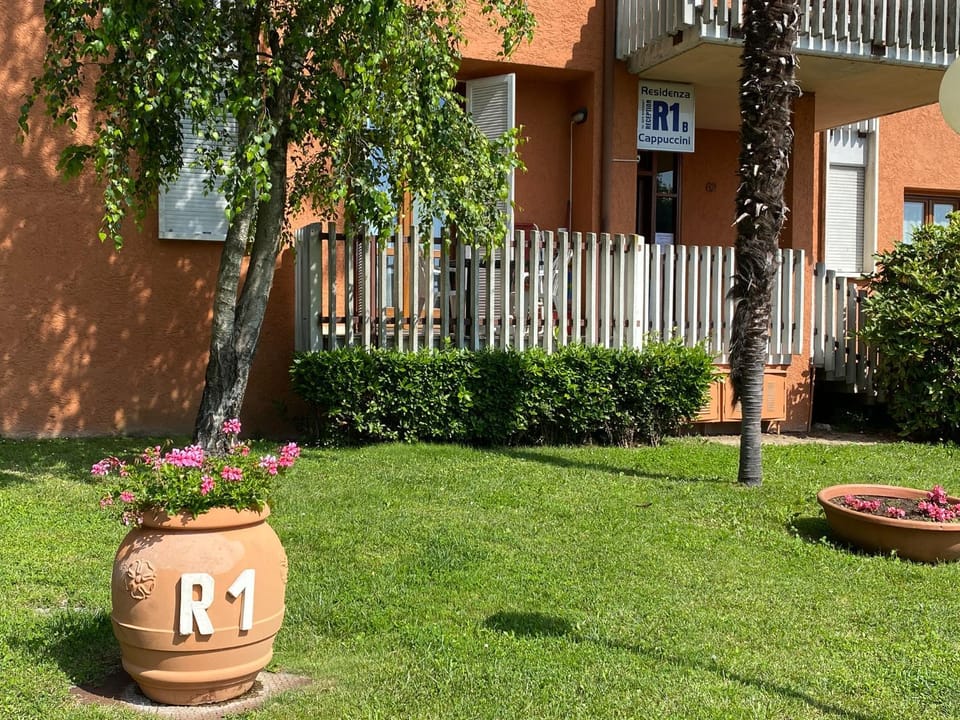 Property building, Property logo or sign, Garden, Garden