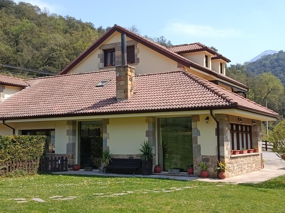 Property building, Facade/entrance, Garden, Garden view, Garden view, Mountain view, Pool view