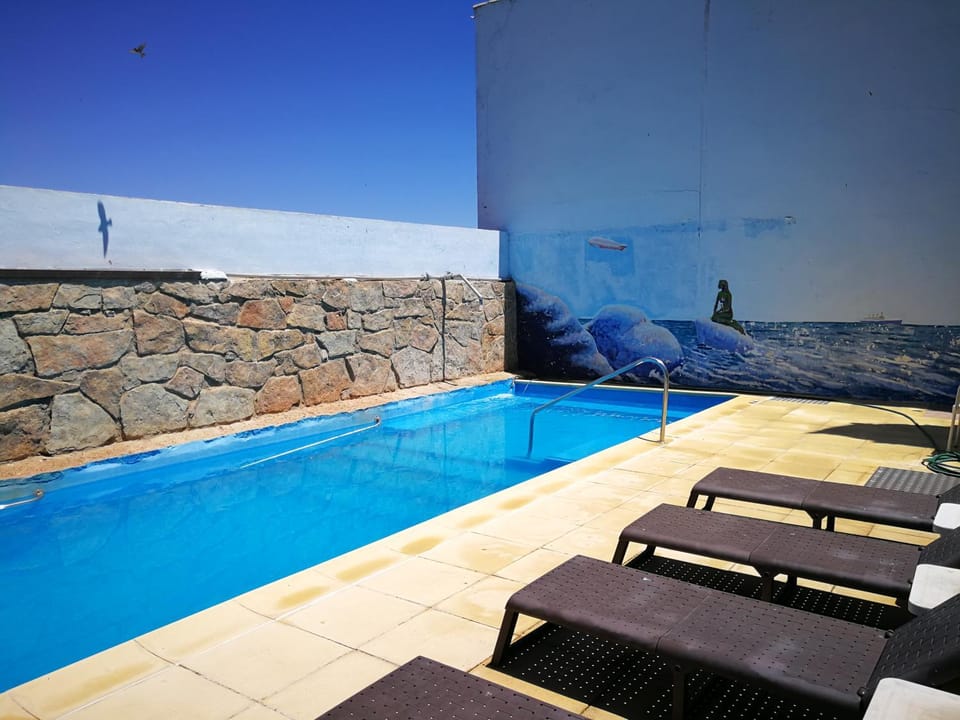 Patio, Pool view, Swimming pool, sunbed
