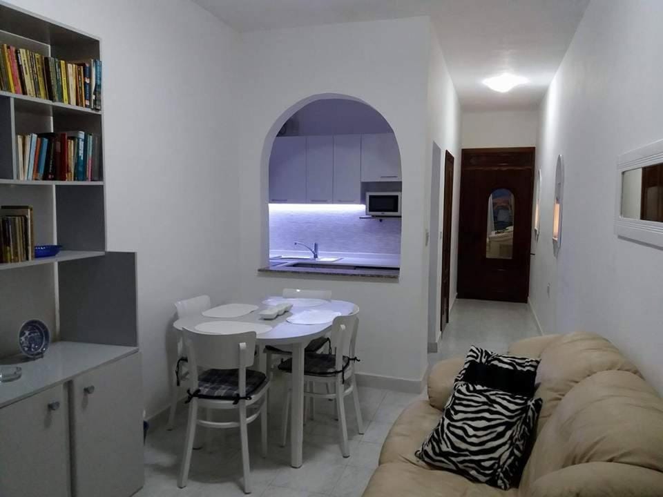 Night, Library, TV and multimedia, Kitchen or kitchenette, Living room, Seating area, Dining area