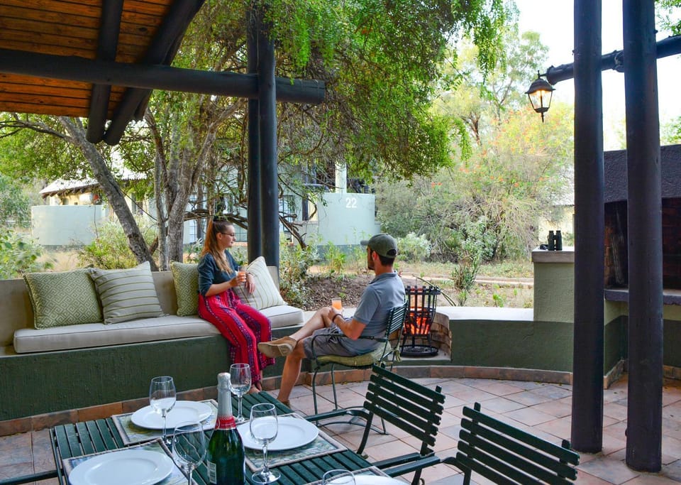 Property building, Patio, Spring, Day, People, Natural landscape, Garden, View (from property/room), Balcony/Terrace, Food and drinks, Seating area, Dining area, Food, Guests, Garden view, Drinks, group of guests, fireplace