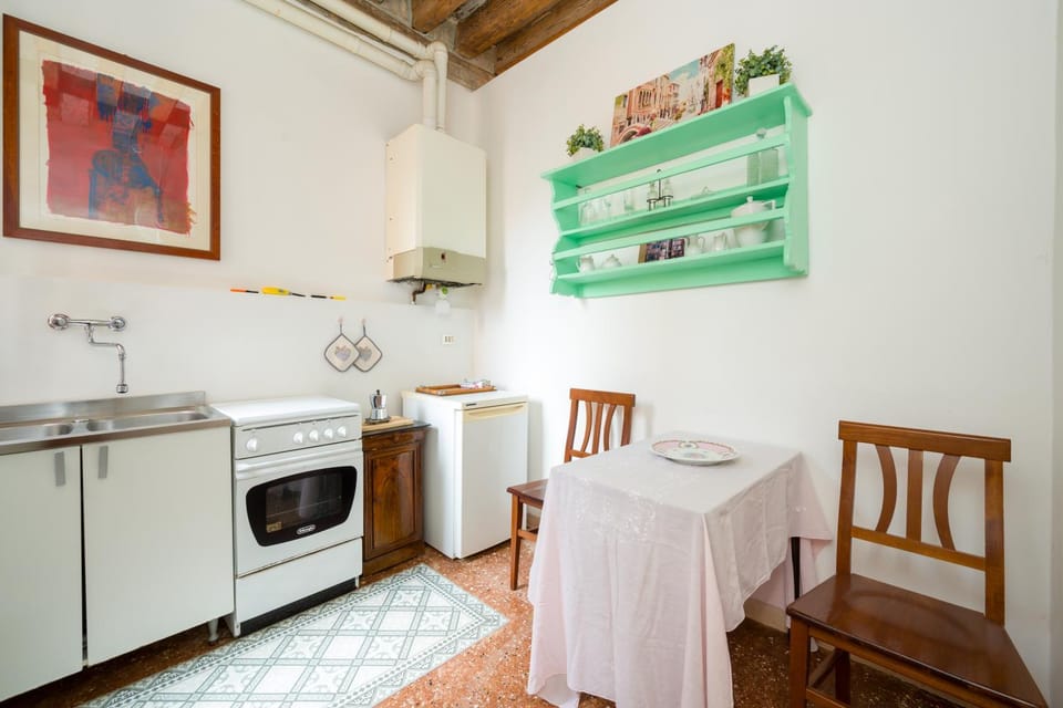 Kitchen or kitchenette, oven, stove