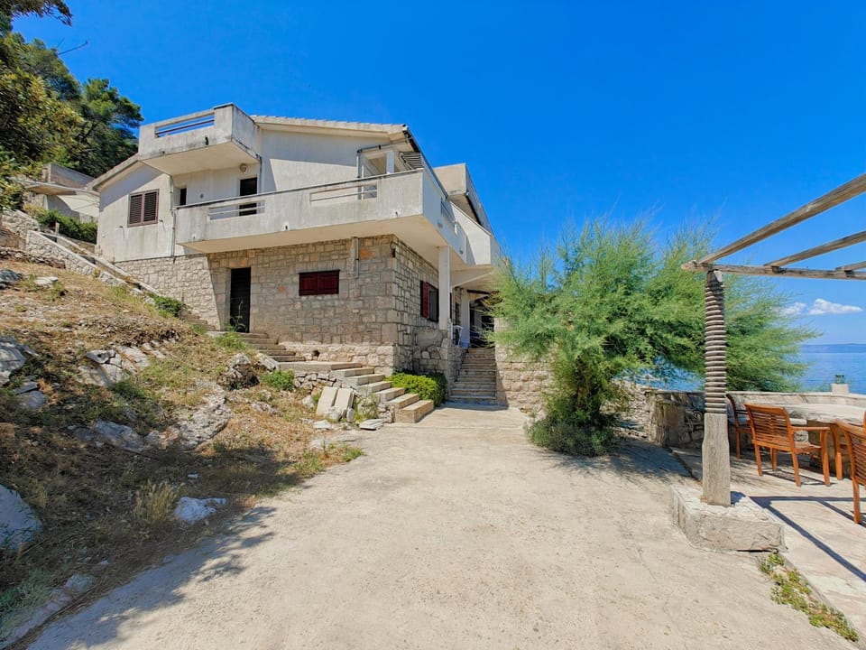 Property building, Facade/entrance, Seating area, Sea view