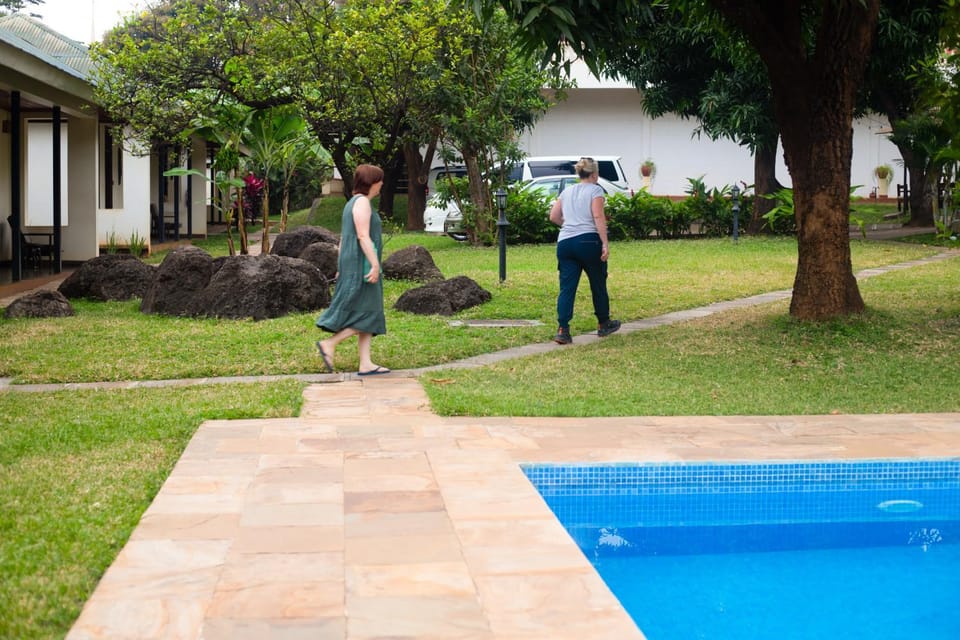 Property building, Day, People, Natural landscape, Garden, Guests, Swimming pool
