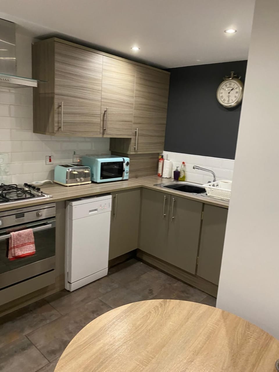 Kitchen or kitchenette, dishwasher, oven, stove, toaster