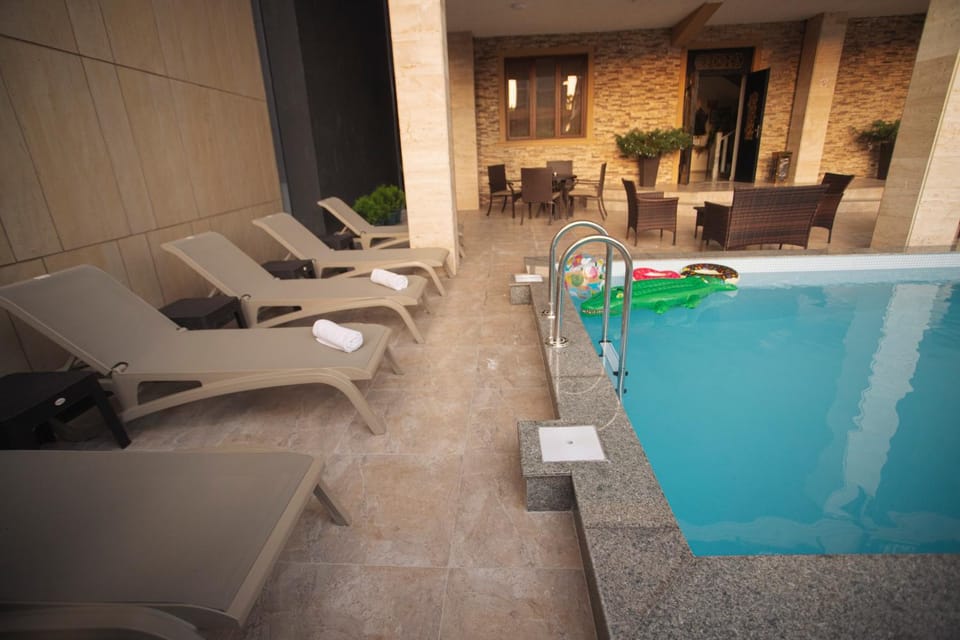 Swimming pool, sunbed