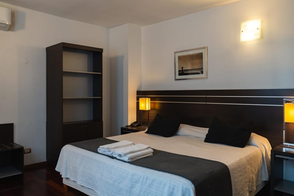 Bed, Bedroom, towels, wardrobe, air conditioner