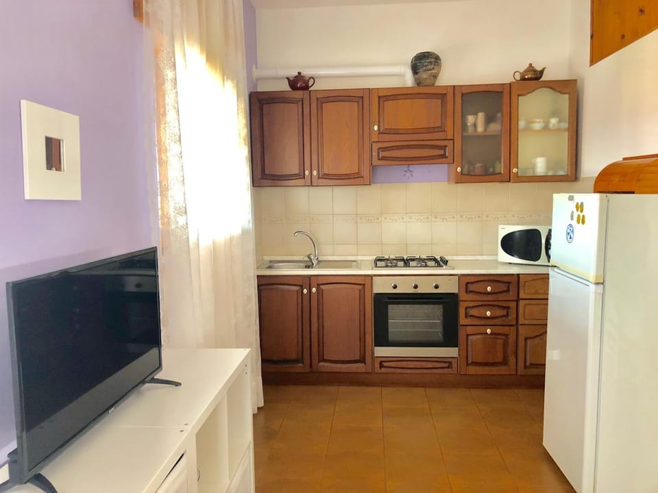 TV and multimedia, Coffee/tea facilities, Balcony/Terrace, Kitchen or kitchenette, Living room, Seating area, Dining area, Garden view, Landmark view, Sea view, Area and facilities, Inner courtyard view