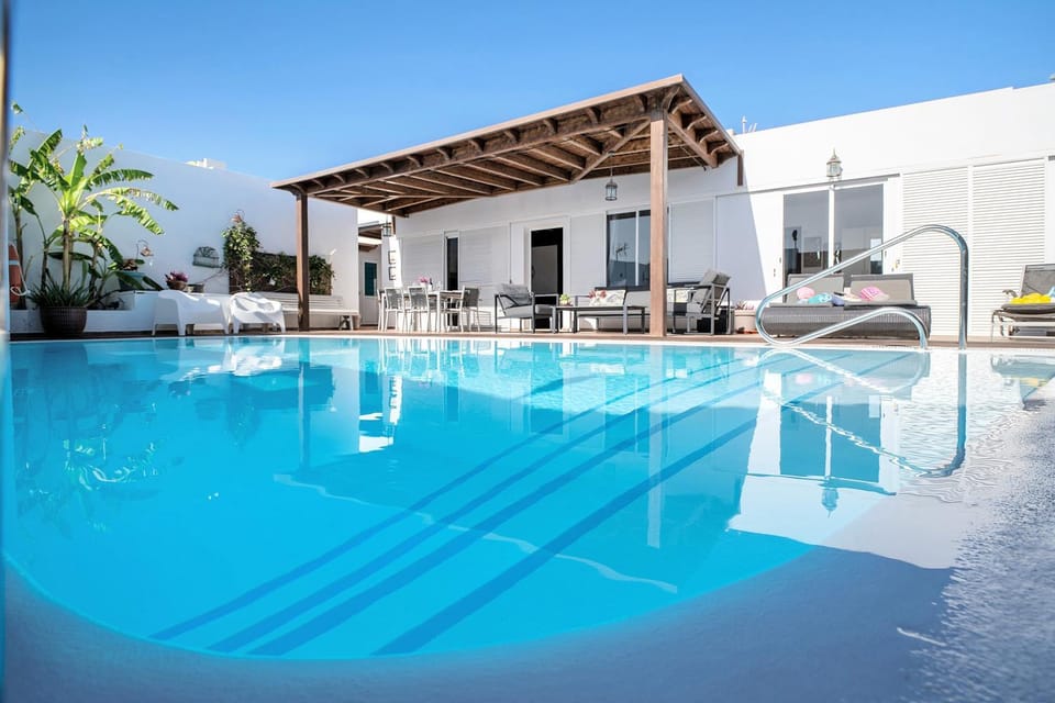 Property building, Living room, Swimming pool