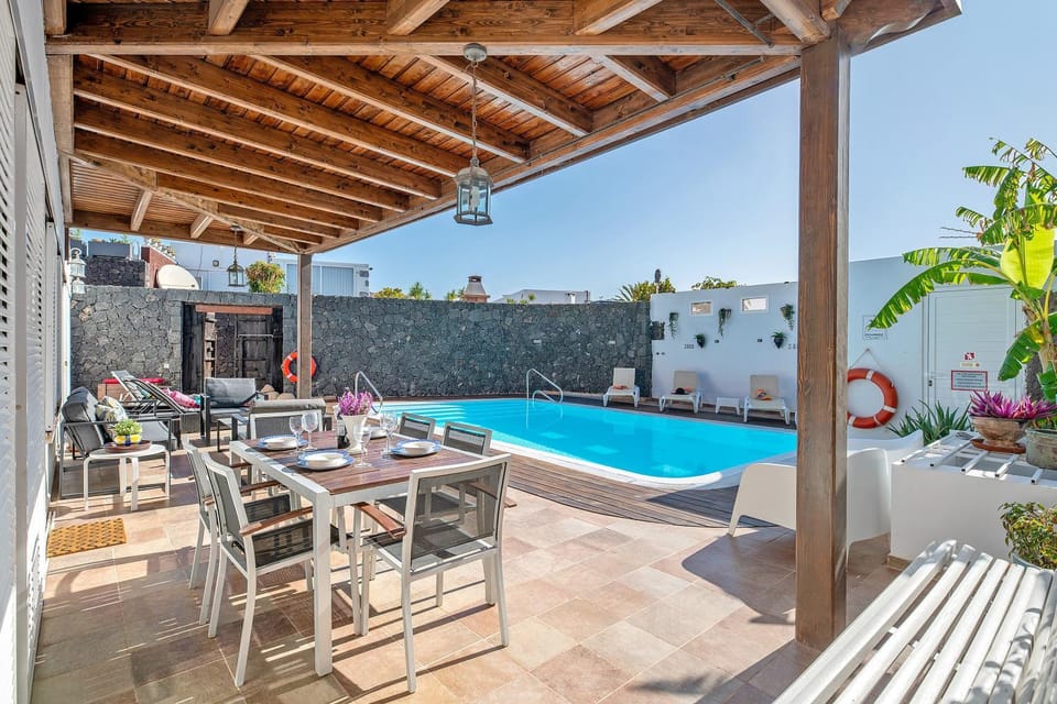 Property building, Living room, Swimming pool