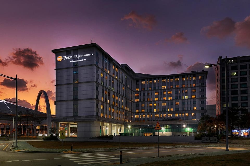 Property building, Facade/entrance, Property logo or sign, Property logo or sign, Property logo or sign, Sunset