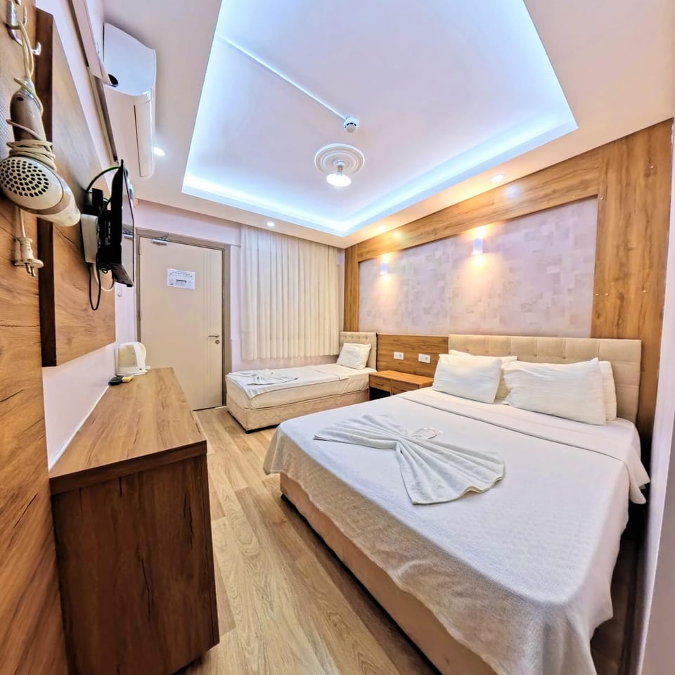 Bed, towels, wardrobe