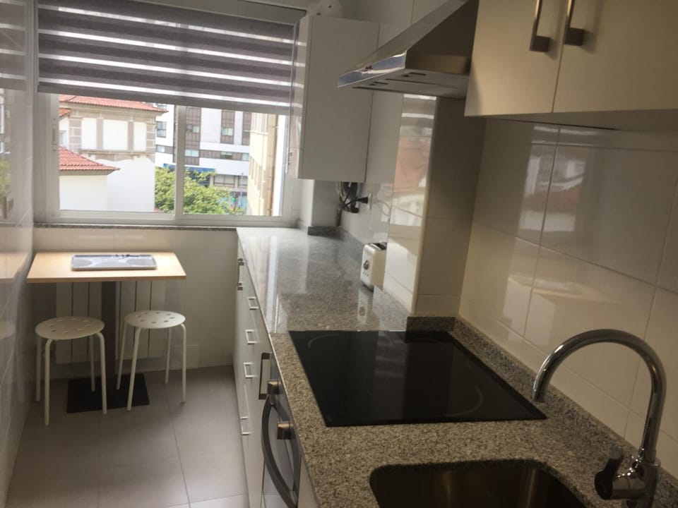 Kitchen or kitchenette, oven