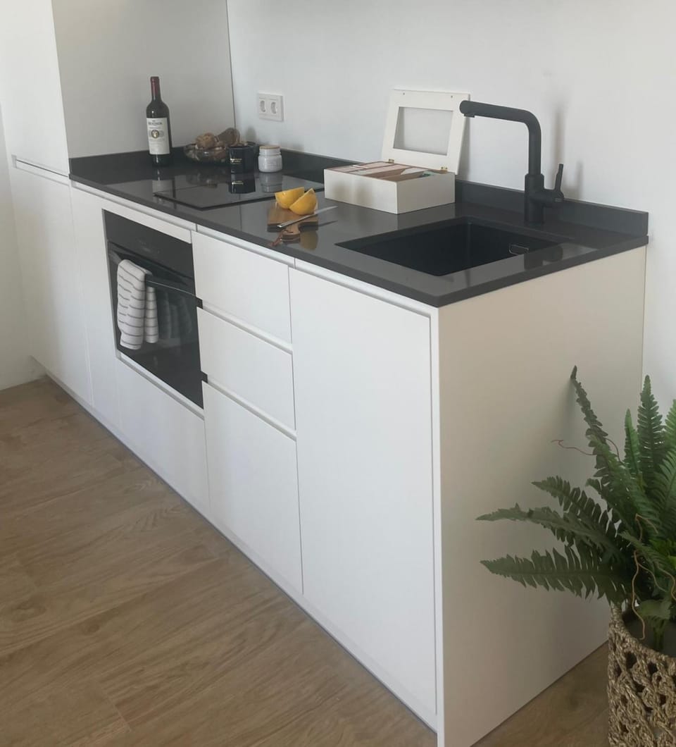 Kitchen or kitchenette, stove