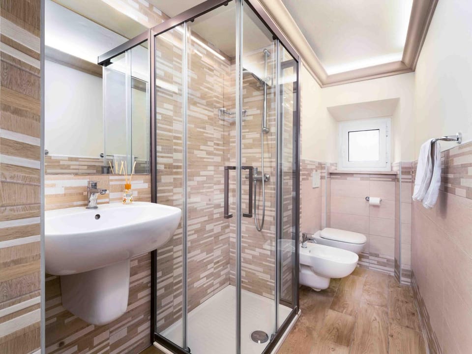 Shower, Bathroom, hair dryier, towels