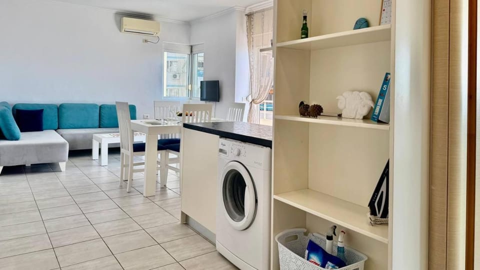 Kitchen or kitchenette, Living room, Seating area, washing machine, air conditioner