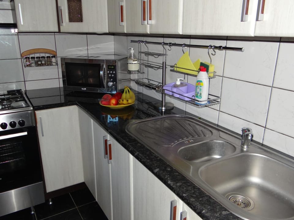 Kitchen or kitchenette, stove