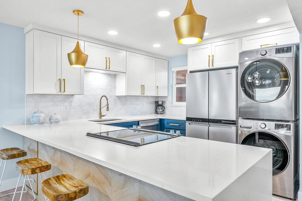 Kitchen or kitchenette, dishwasher, oven, stove, washing machine, dryer
