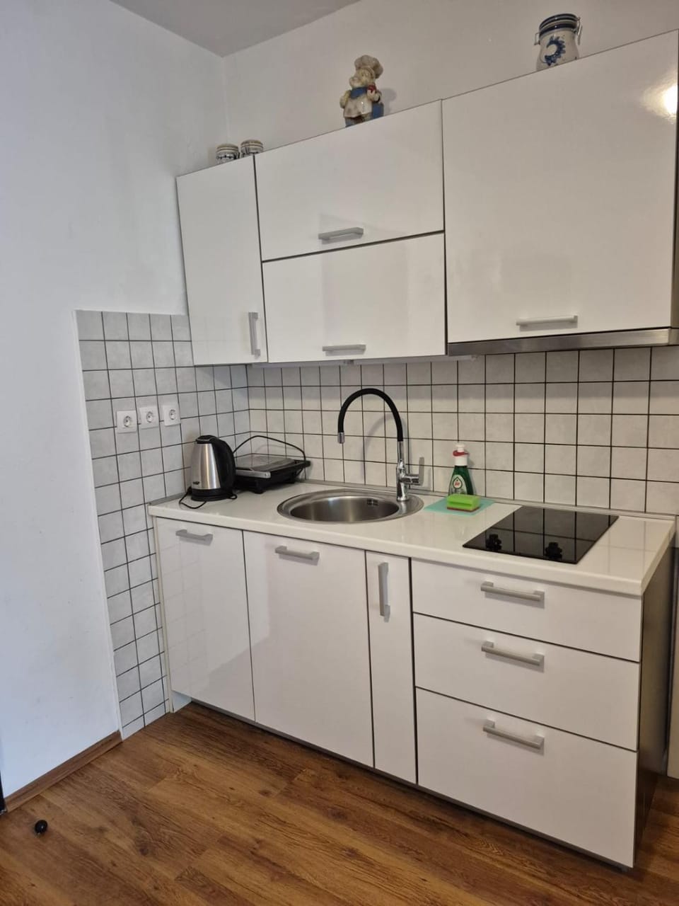 Kitchen or kitchenette, stove, toaster