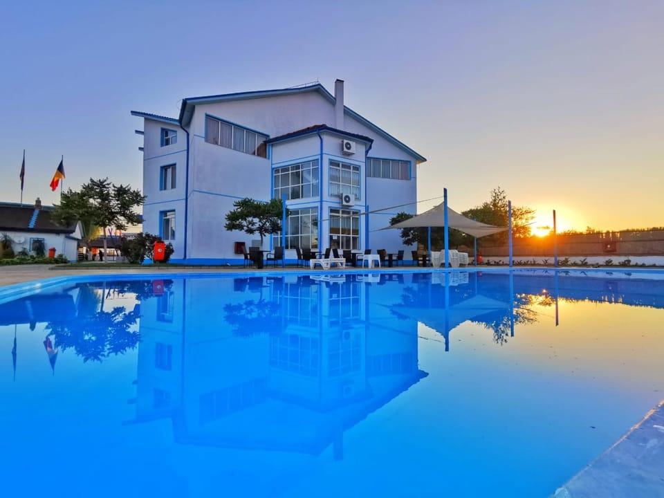 Property building, Swimming pool, Sunrise