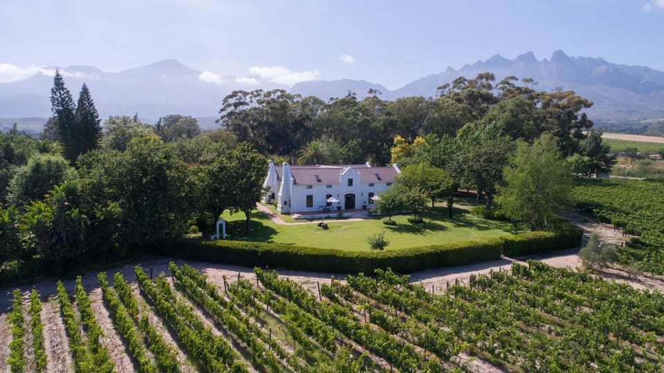 Property building, Natural landscape, Bird's eye view, Garden, Garden view, Mountain view