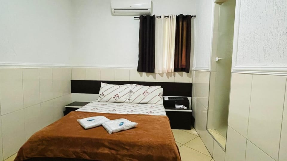 Bed, Photo of the whole room, Bedroom, towels, air conditioner