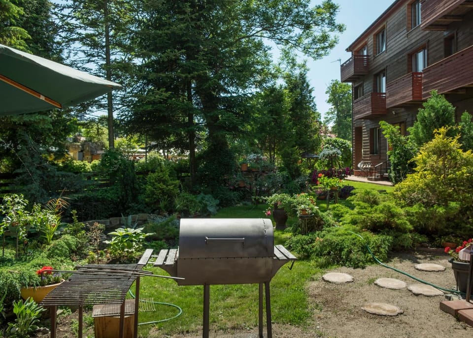 Property building, Patio, BBQ facilities, Garden view
