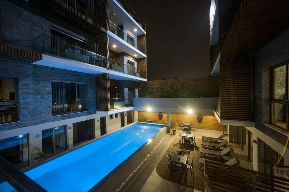 Property building, Patio, Night, View (from property/room), Balcony/Terrace, Pool view, Swimming pool, Swimming pool