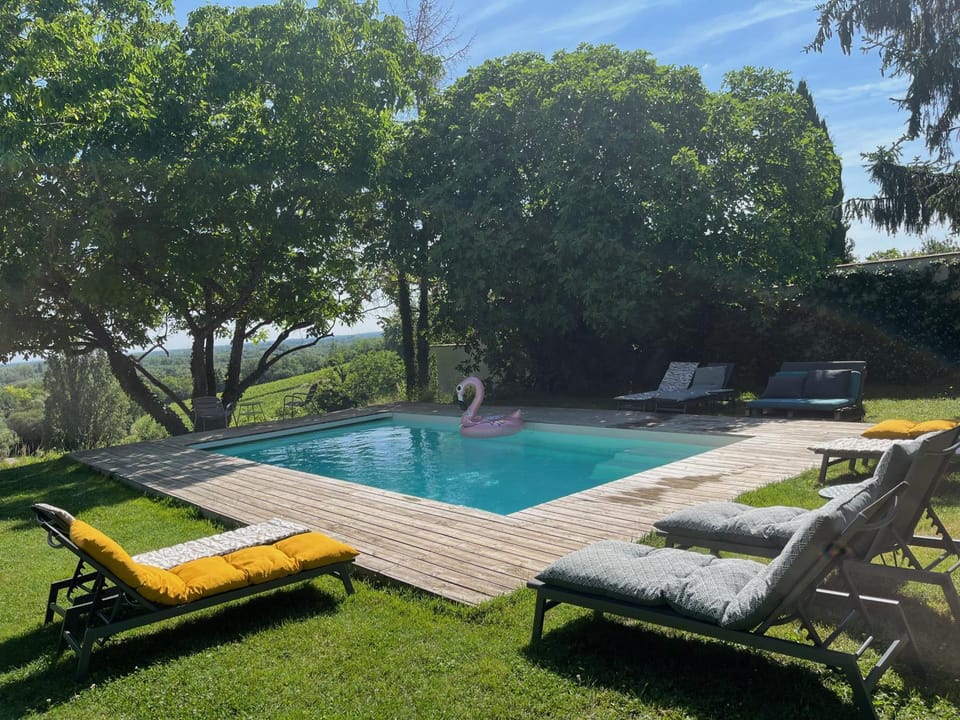 Day, Natural landscape, Garden, Swimming pool, sunbed