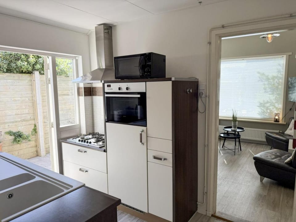 Kitchen or kitchenette, oven, stove