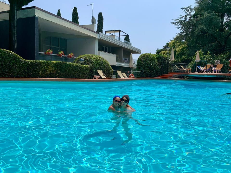 People, Pool view, Swimming pool, children, group of guests, sunbed
