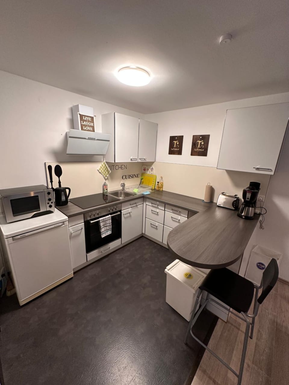 Kitchen or kitchenette, stove, toaster