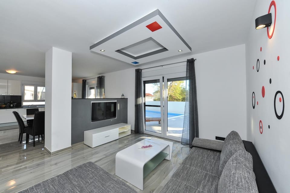 TV and multimedia, Kitchen or kitchenette, Living room, Seating area, Dining area, Pool view