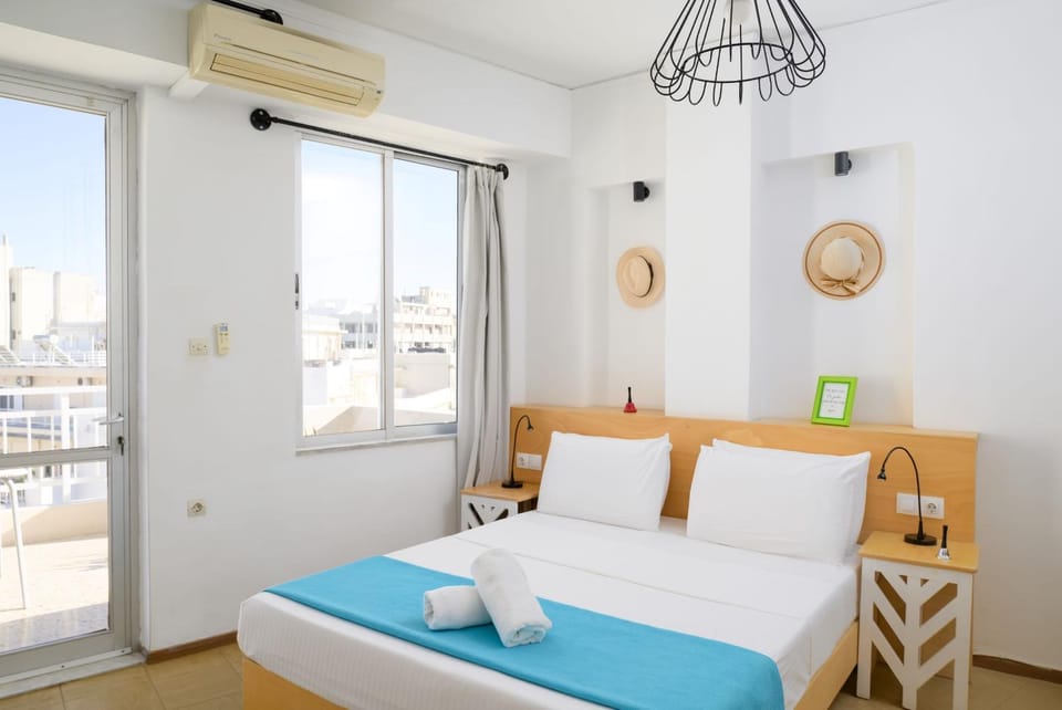 View (from property/room), Balcony/Terrace, Bedroom, towels, air conditioner