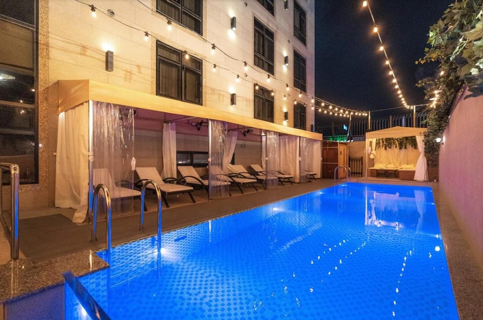 Property building, Night, Pool view, Swimming pool