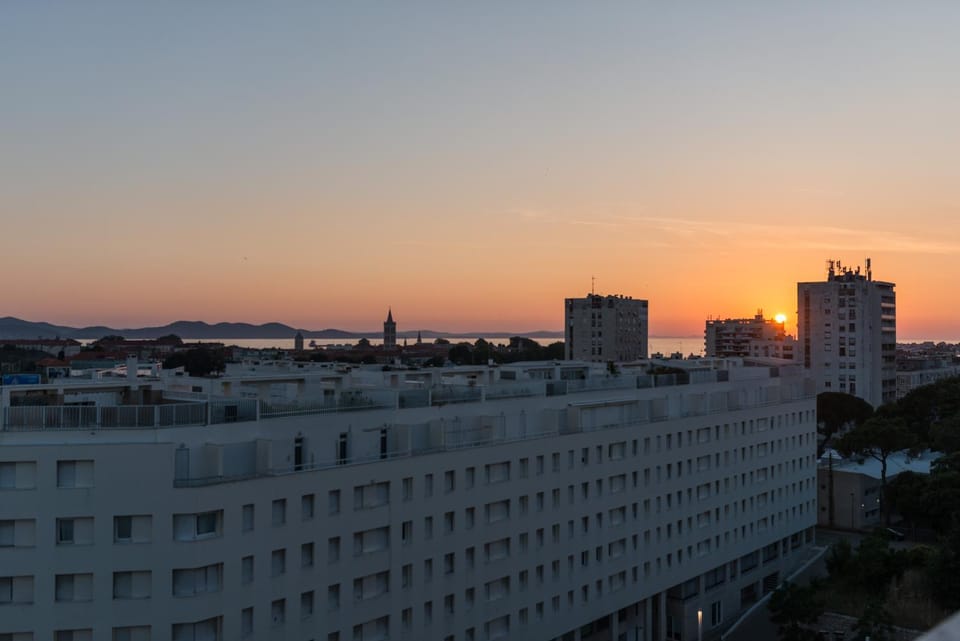 Property building, Bird's eye view, City view, Sea view, Sunset